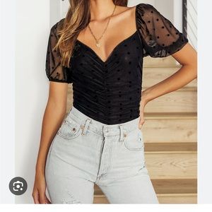 Lulu’s Darling Style Black Polka Dot Mesh
Ruched Puff Sleeve Bodysuit